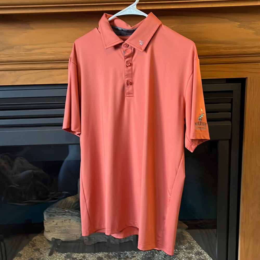 Men’s medium Swannies golf shirt. Burnt orange color